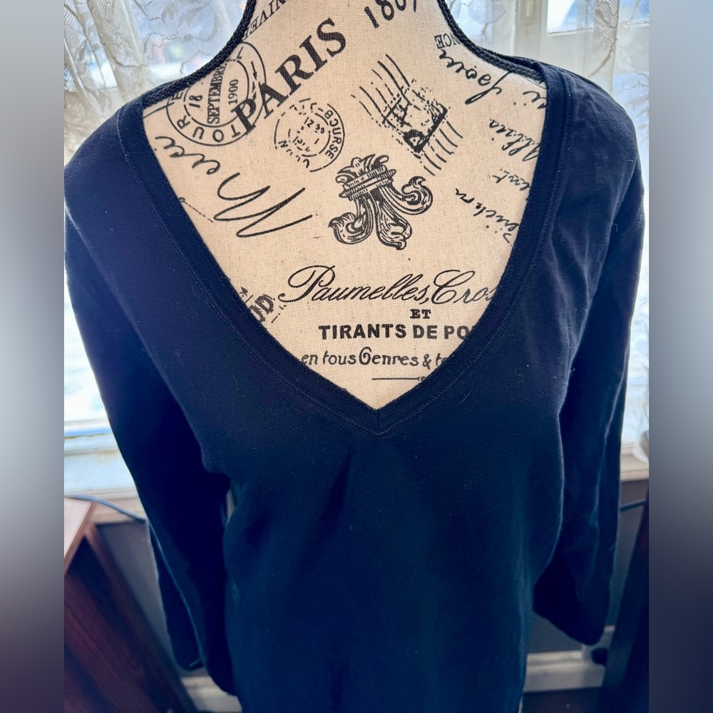 Black, long sleeve Tshirt.